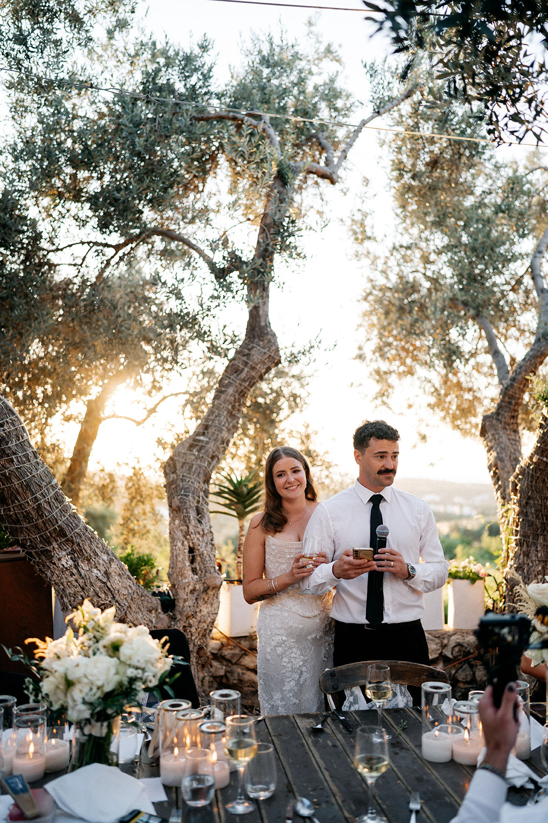 sunset during speeches at Renee and Daniel's Agreco Farm Wedding, Rythemno, Crete - Meredith Lord Photography sunset during speeches at Renee and Daniel's Agreco Farm Wedding, Rythemno, Crete